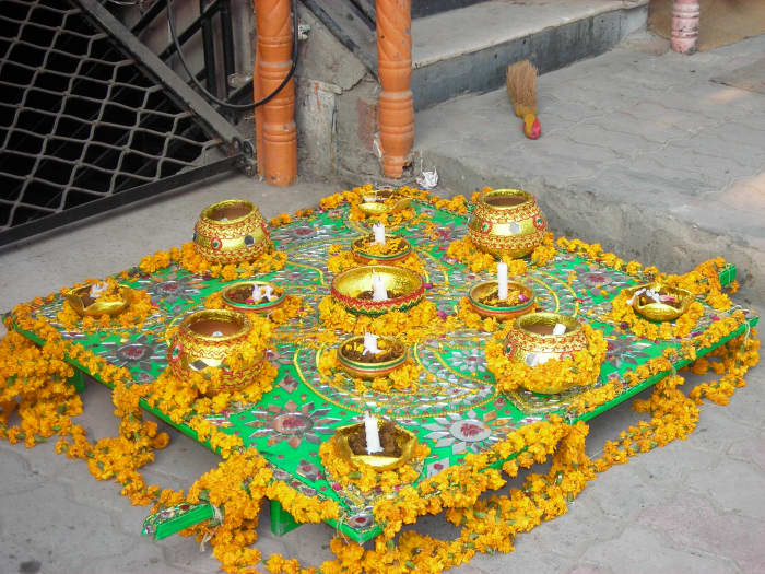 It's a tradition for the bridegroom's family to carry henna on a decorated platter as gift for the bride during the wedding ceremony