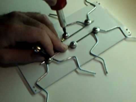 Seen here is the construction of the simple Koch curve antenna, that is extraordinarily easy to make. You can make a triangle based peg board and simply wrap in a Koch curve design.