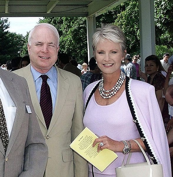 Cindy McCain wearing a 3 strand pearl necklace - photo from wikipedia taken at a graduation with her husband Senator John McCain