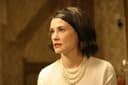 Demi Moore in the movie "Flawless" wore three strand pearls throughout the entire movie - here is a photo of the ivory set. She also wore a necklace with 3 strands of black pearls in the same movie.