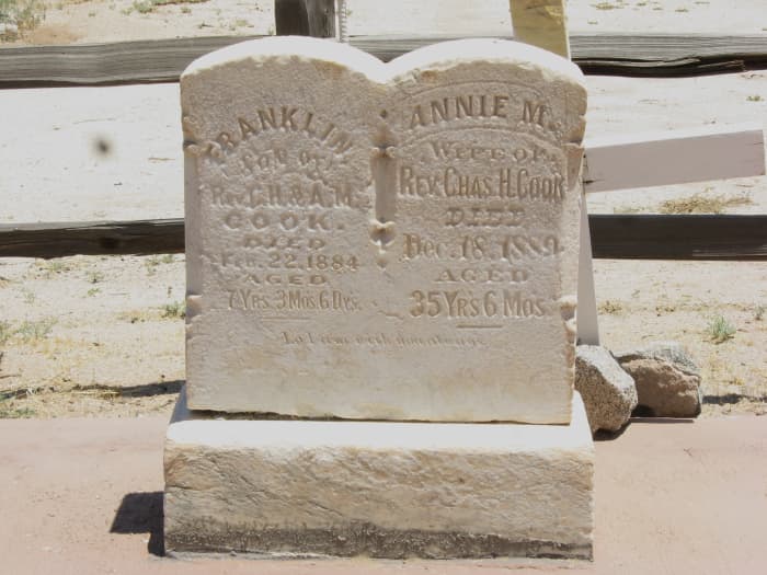 Grave markers of Reverend Charles Cook's wife and infant son in cemetery adjoining the historic Cook Church in Sacaton, Arizona