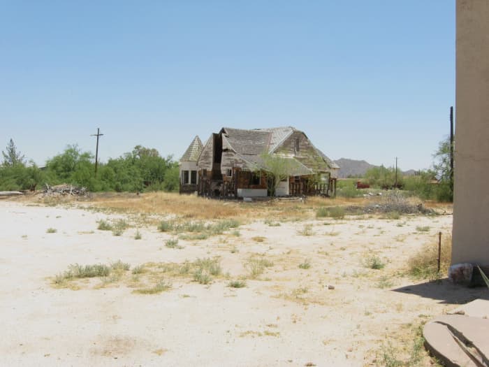 Remains of half-burned original parsonage next to Cook Church in Sacaton, AZ