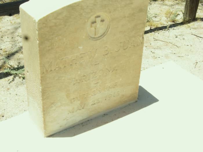 Headstone of WW I Hero Mathew Juan in small cemetery next to Cook Memorial Presbyterian Church in Sacaton, Arizona