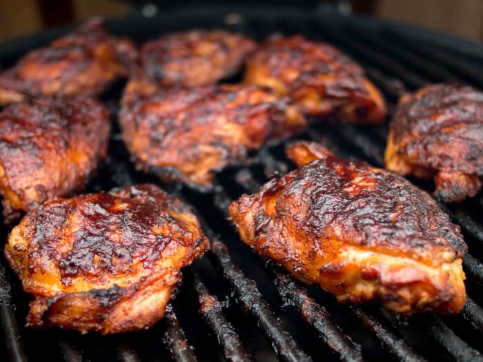 You can cook your barbecue chicken thighs with the bones in them or you can take the bones out. I like to take the bones out and leave the skin on.