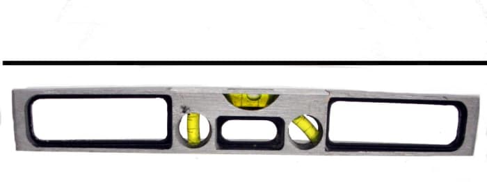 This is a 'torpedo' level. The insurance wanted to substitute this item for the combination square, below.