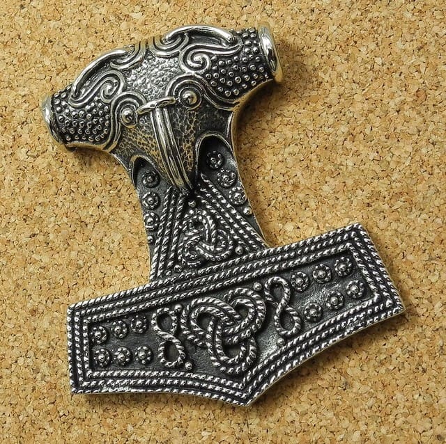 Mjoelnir pendant - every warrior would have one of these hanging from a chain or cord around his neck, to thumb in times of need.