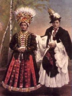 Matyo folk costume with colorful embroidery. Decorated clothing as well as painted surfaces in their homes was common in the peasant villages; each had a distinctive style.