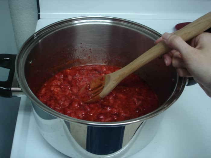 Step 4: Stir the mixture well to dissolve all the sugar. Continue to stir constantly as you bring it back to a boil.