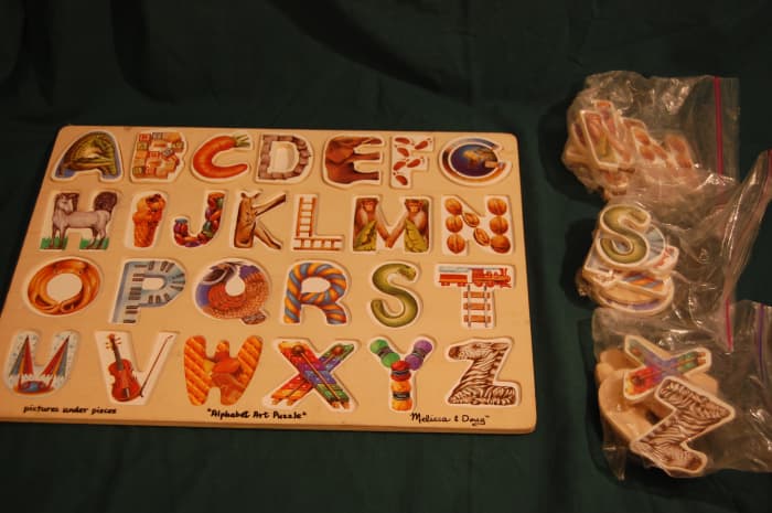 Large Melissa & Doug non-connecting alphabet puzzle. Separate letters by row for younger children.
