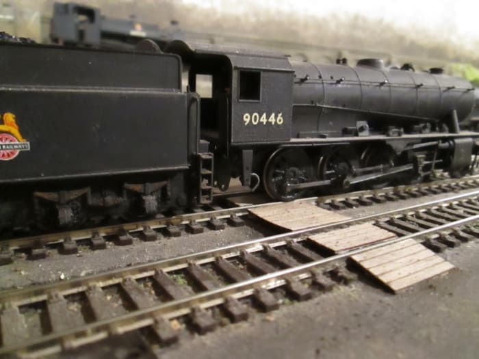 Riddles' WD 2-8-0 was introduced during WWII, some went overseas after D-Day. Many were taken over by the LNER, subsequently BR(E). This is 90446 of Newport Shed (51B) near Middlesbrough (Bachmann model)