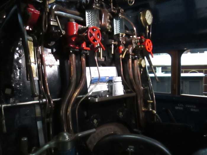 Looking into the cab of 'Mallard' at the NRM, complete with crewman's tea can (white enamel pot with handle)