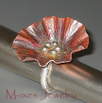 Marjorie of M-Ixes Jewelry finds Etsy a good place to sell her beautiful metalwork. (Oh and check out the banner by yours truly :P)
