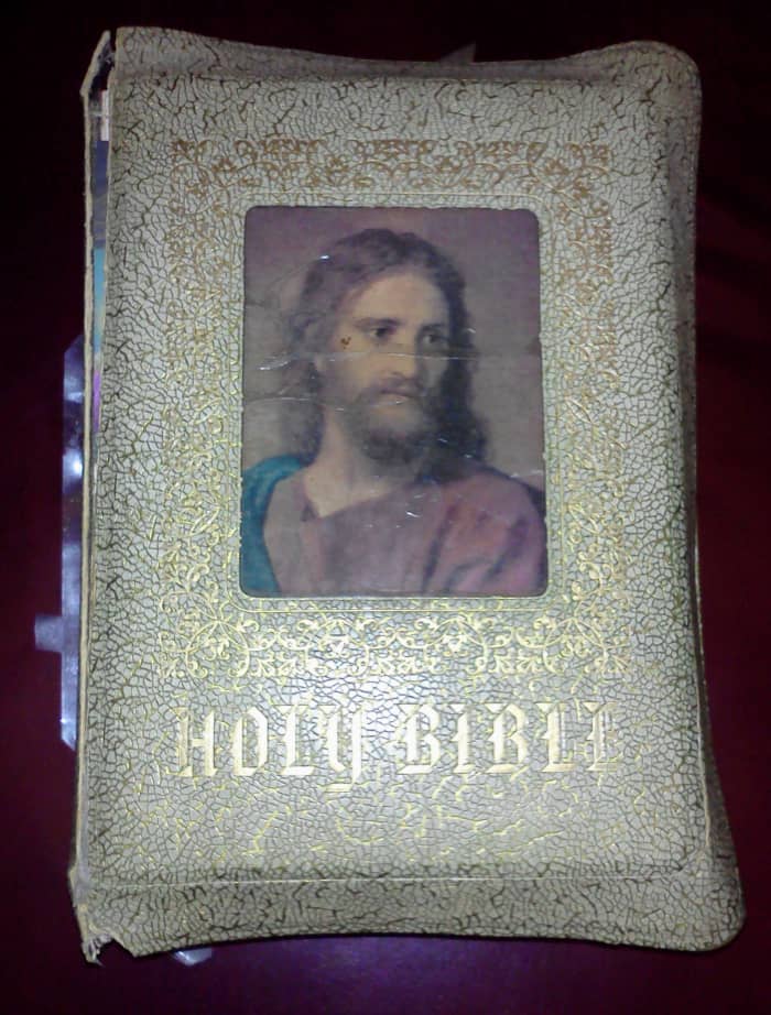 This is our family Bible handed down from my parents. A friend who is a librarian was helping me to repair it. You can see where my mom had taped it together.