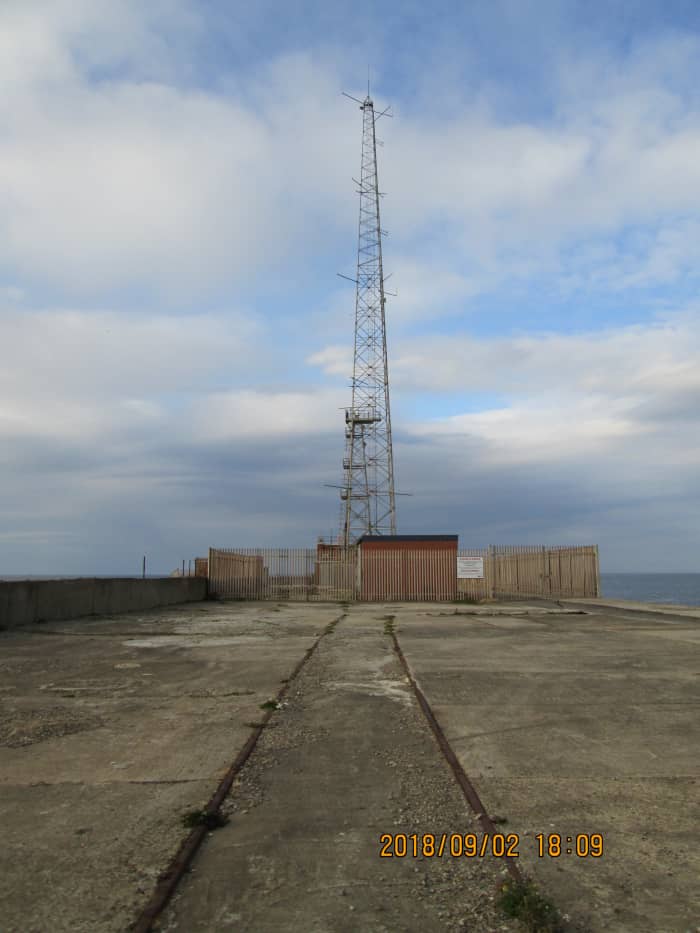 This is as much as there is to show at the end of the pier - breakwater to be exact. The beacon tower has gone, replaced by a radar tower and radio antenna. This is as far as you go, mate. Beyond the fence is 'no-go'. Off limits. Beyond that it's wet