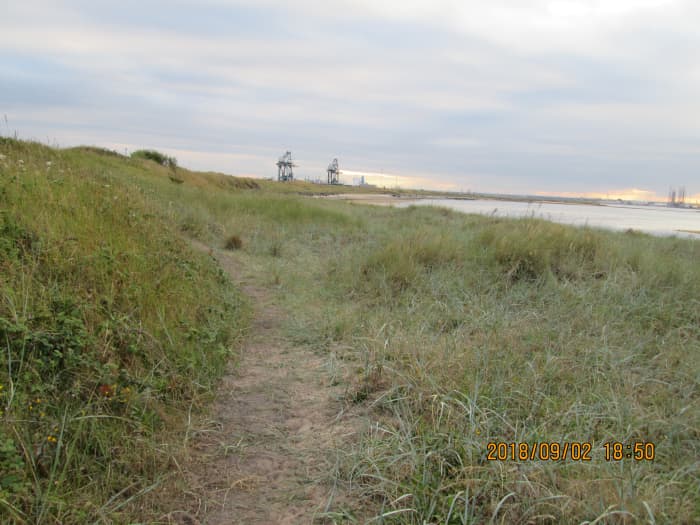 The view back beyond Paddy's Hole to the Tees Ore Terminal between the South Gare and the Riverside on the south bank - time was, the works were 'fed' by local ore from the Cleveland Hills