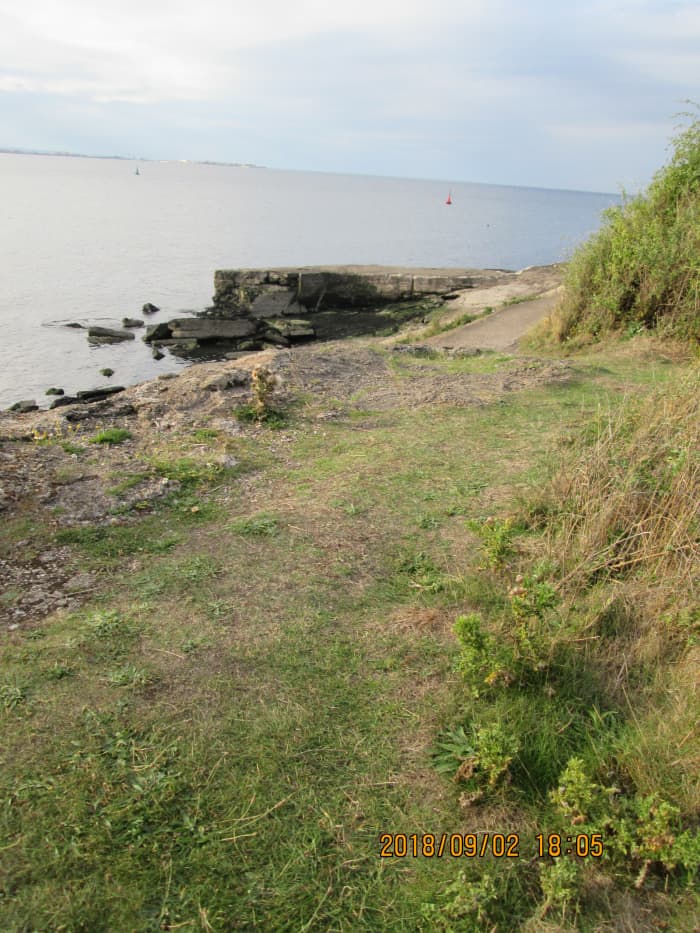Signs of ageing: broken concrete on the north flank of the gare below the 'path' worn into the fabric of the structure