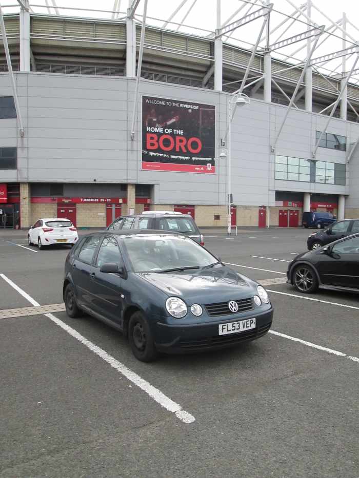 Strategically posed, present mode of transport juxtaposed against the main entrance from the extensive car park