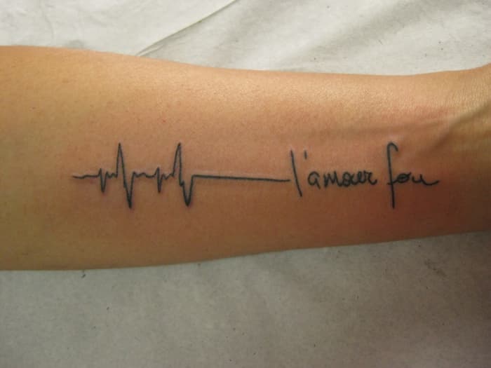 At the end of the line is a message in French, with the first word speaking of love. I couldn't make out the second word. If someone can identify it, leave it in the comments section.