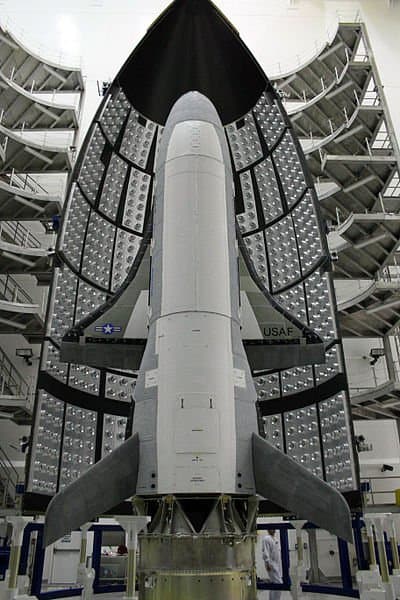 This photograph of the X-37B Orbital Test Vehicle in the encapsulation cell at the Astrotech facility in Titusville, Florida was taken on April 13, 2010. The X-37B is the US's newest and most advanced unmanned re-entry spacecraft.