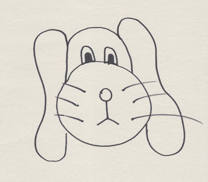 Draw blobs on either side of the semi-circle/circle that could pass for both a slide and ears. Give yourself some creative license here!