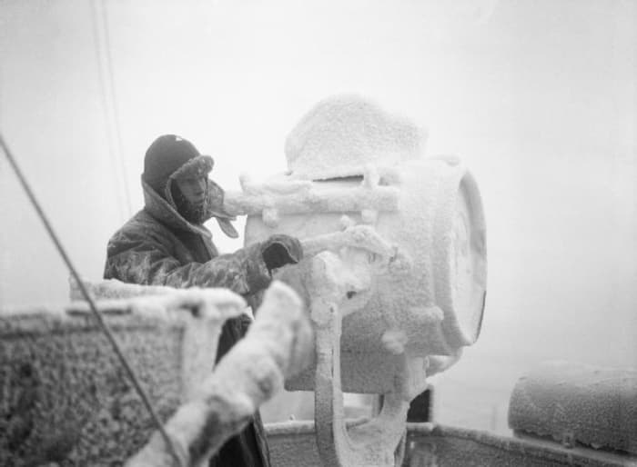 This scene was common during the Murmansk Run. This is HMS Sheffield, covered in ice. The conditions were really terrible!