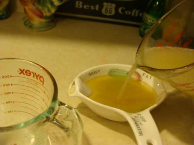Just pour your broth in your separator. Any small bits will stay in the bottom of your pitcher if you pour slowly into your separator, saving you a finer straining later.