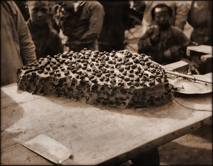 a cake of millet and jujubes which was a delicacy for the peasants and coolies in China. For 2 0r 3 coppers they got a nice fat slice.