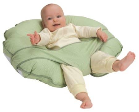 Nursing pillows like this can be used as a tummy time aid too, and can help the baby sit up with adequate support. It is also reported to 'enhance digestion and help reduce reflux'.