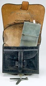 Fig. 13: Interior of the Cartridge Box, with one of the two Tins to hold cartridges, and the tool to dismantle the musket