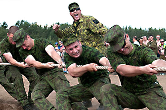 Lithuanian soldiers take part in a military tug of war competition in the City of Pabrade in Lithuania in 2013