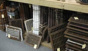 Old iron grates or heavy pieces of industrial type metal, often discarded, make great center pieces for a wall grouping.
