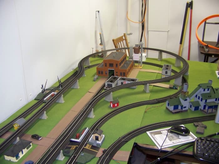 Can't fit the track layout you desire? Go vertical by using gradual trestles to lift part of the track. As you can see from the picture I wanted two loops but could not fit them in the allotted space, I elevated the inner loop with trestles.