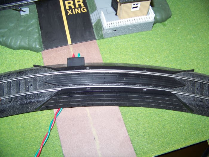 I had a bunch the rerailer track sections lying around from train sets I purchased. I insert these track throughout my layout to re-rail trains that may start to come derailed during operation.