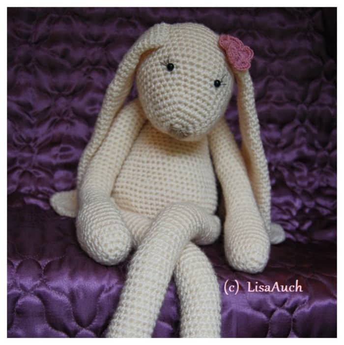 This Bunny was given to a Child when she was going through treatment in Hospital. It sat looking over her as she got better. She still wanders around with Bunny