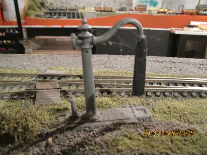 The (Mike's Models) North Eastern water crane is sited between the loop and platform road to allow a passenger or adjacent goods loco crew to replenish water tanks