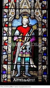 Stained glass window of a church picturing Alfred the Great in Hampshire, England