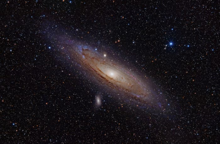 The Andromeda Galaxy is a spiral galaxy approximately 2.5 million light years away in the constellation Andromeda. The image also shows Messier Objects 32 and 110, as well as NGC 206 (a bright star cloud in the Andromeda Galaxy) and the star Nu Andro
