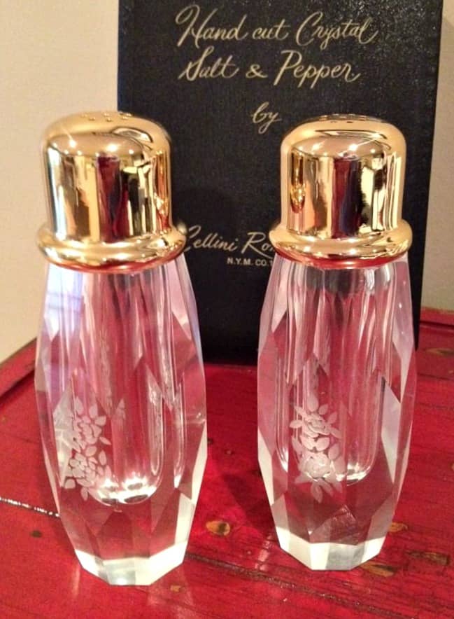 Vintage Cellini Romanesque hand cut crystal salt and pepper shakers with their original box. These salt and pepper shaker are hand cut crystal with pretty flower design on the sides.