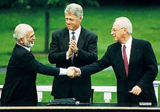 King Hussein I of Jordan, U.S. President Bill Clinton and Israel Prime Minister Yitzhak Rabin at Peace Negotiations in Washington D.C. on July 25, 1994