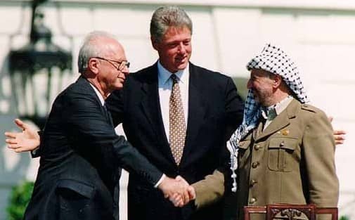 Israeli Prime Minister Yitzhak Rabin, U.S. President Bill Clinton, and PLO Chairman Yasser Arafat in Washington D.C., September 13, 1993