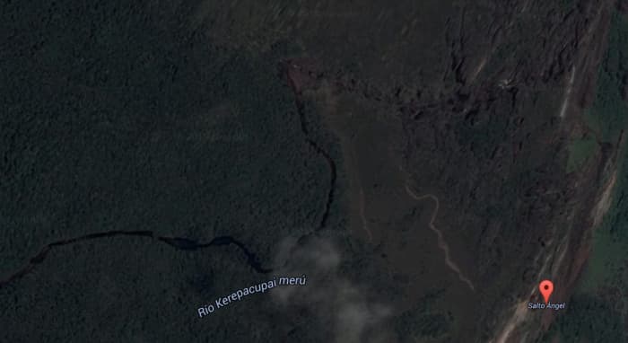 Angel Falls is on the Gauja River in Bolivar state, Venezuela. The Gauja River is seen in this photo on the left flowing to the falls near the upper right corner of the picture.
