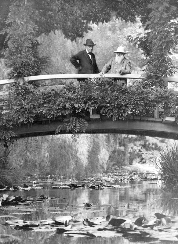 An image of Claude Monet in his garden in Giverny with an unidentified visitor. From The New York Times photo archive, dated only 1922, author not given