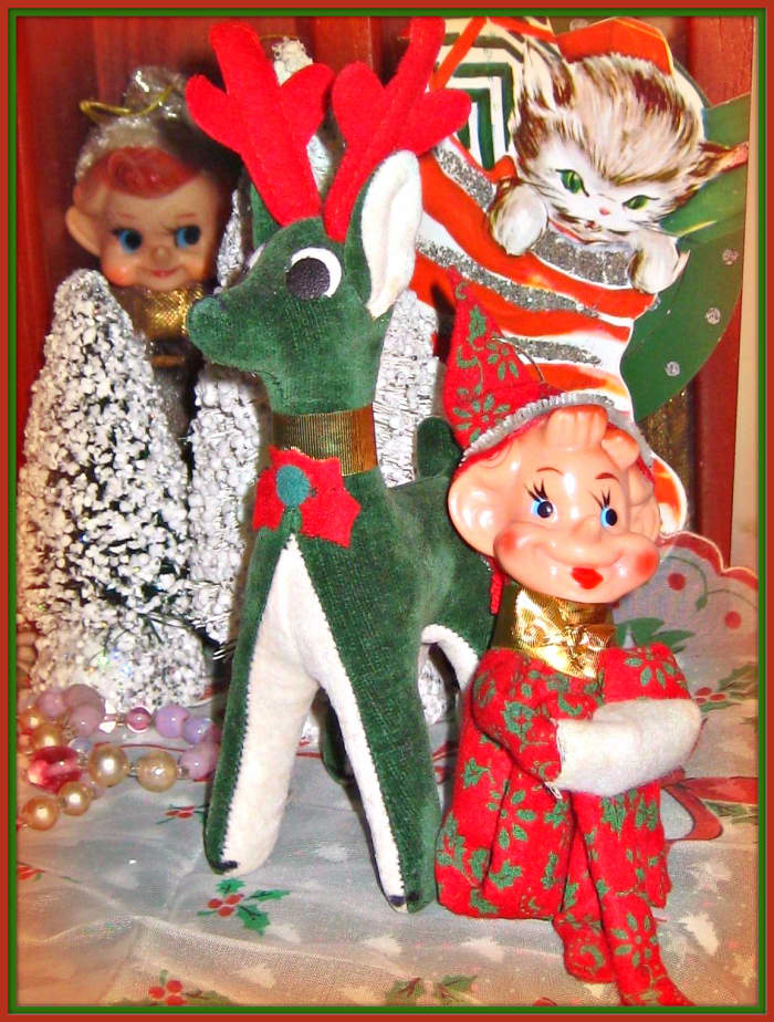 Here you have a fabulous and very fun vintage pixie and dream pet reindeer ready for the Holiday. He is a fancy red felt, and the reindeer is green velveteen, Dream Pet #424