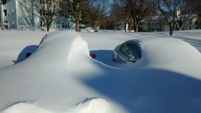 January 23, 2016. After the blizzard, roads and cars in Maryland were buried in the snow.