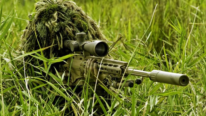 You'll doubtless see him at this range, would you be able to pick him out against a backdrop of long grass? His gun is painted Army khaki to blend in, but he has to watch the sun doesn't reflect off his sights. The glass is set well in from the rim