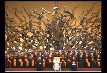 A depiction of Lucifer that stands behind the Pope's throne at the Vatican. It has been explained away in various ways, but is clearly Lucifer. It represents his looks in male form