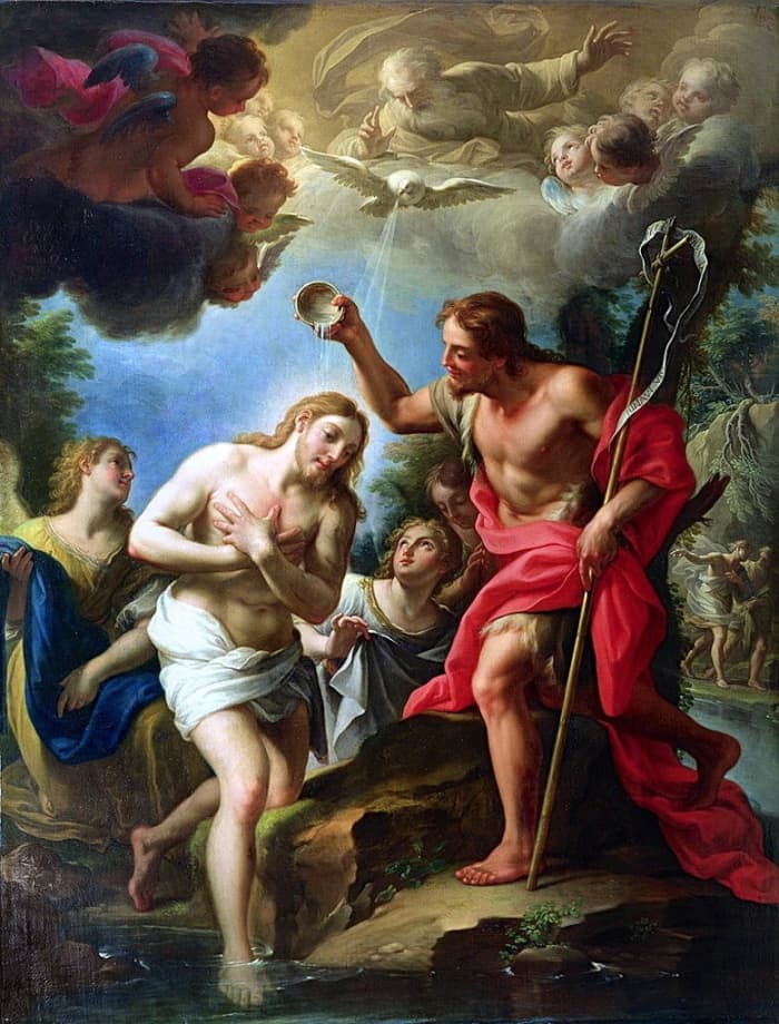 The Baptism of Jesus. Clouds often represent God in the Bible, and in this photo Father God is in the clouds. The dove represents the Holy Spirit, and Jesus is in the foreground being baptized, though not by submersion, by John the Baptist.