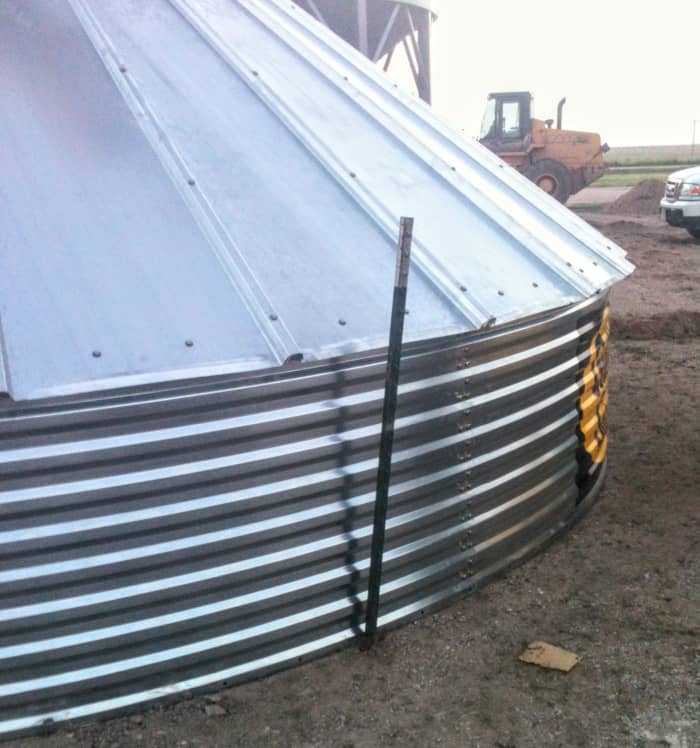 Another method you may use to stabilize your bin between building sessions is to block it in with T-posts put into the ground a foot or two, depending on how hard your ground is.