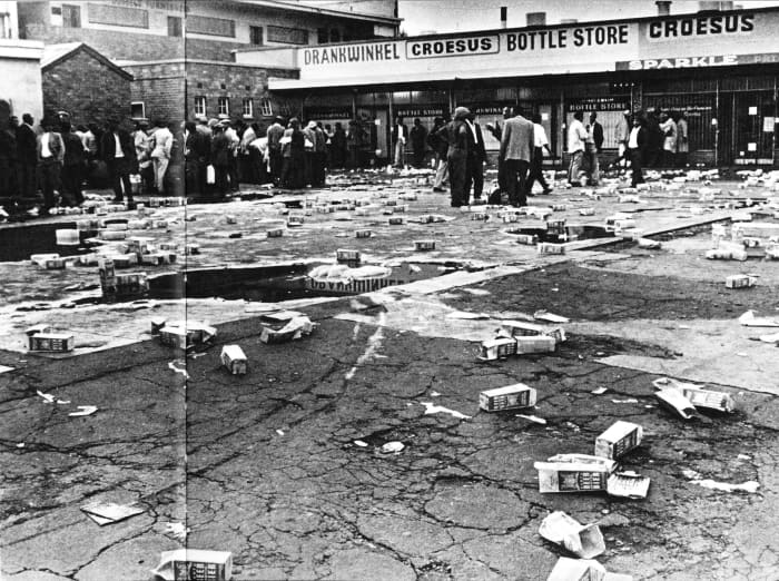 Cartons of "Bantu Beer" littered all over the grounds where men were drinking it. This was sold by the government and was called "Bantu Beer", and has been poisoned over the decades, not as Botha claims was to be done from 1985, but done from the1950