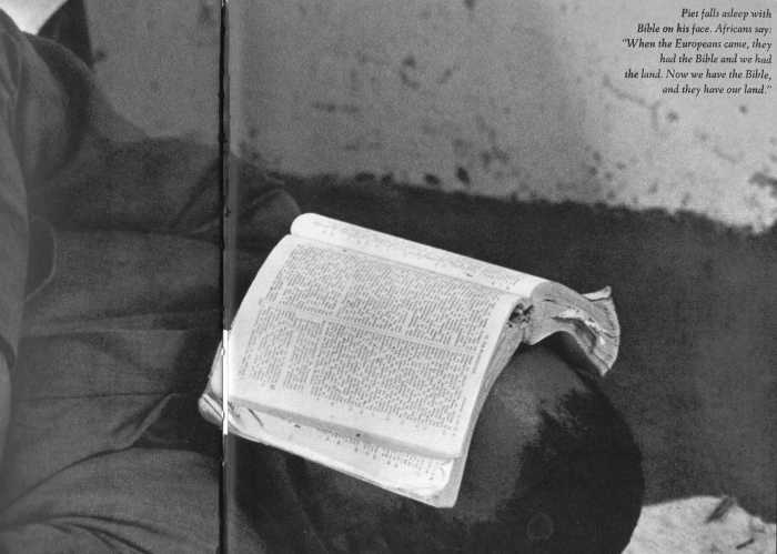 The caption reads: Piet falls asleep with Bible on his face, Africans say: When the Europeans came, they had the Bible a. Now we have the Bible, and they have our land."